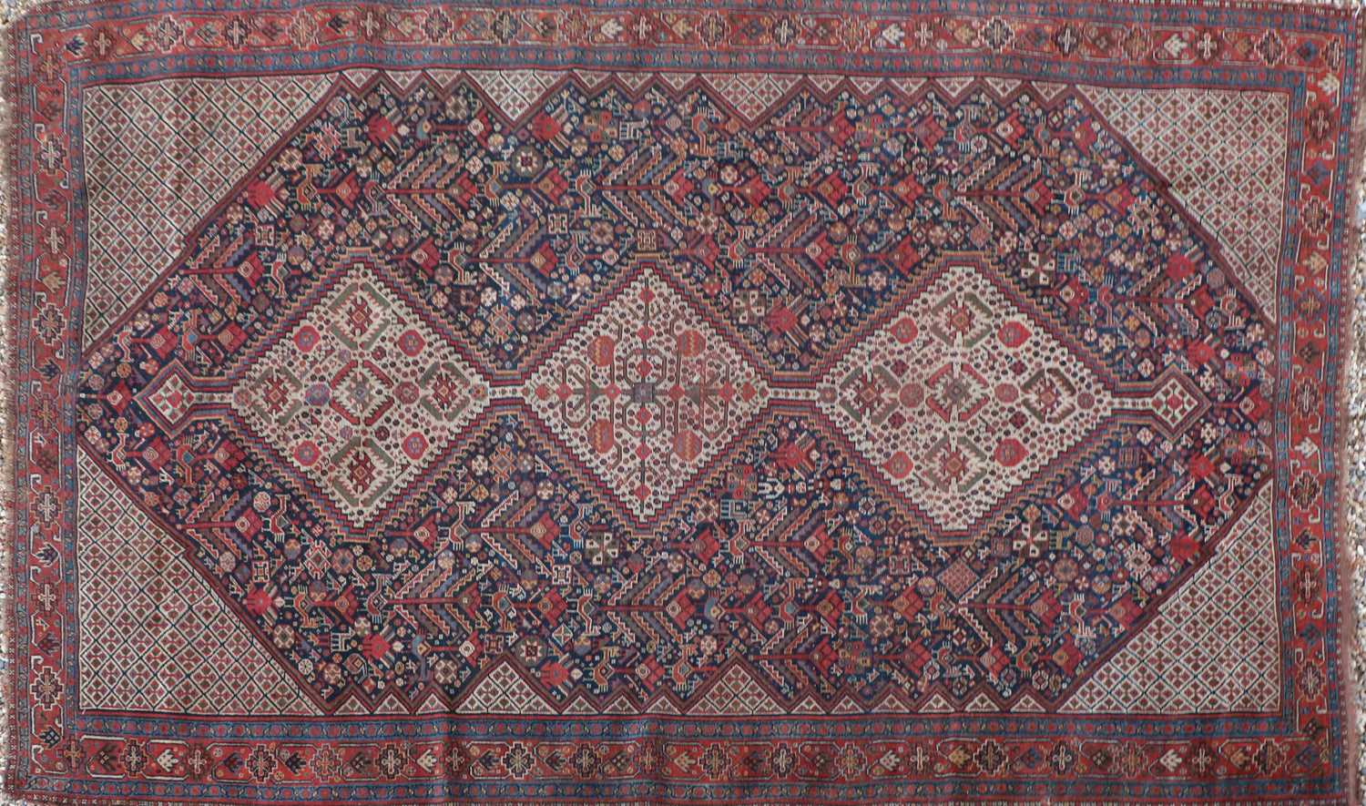 Lot 353 - A Khamseh tribal wool rug