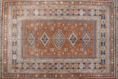 Lot 354 - A tribal wool carpet