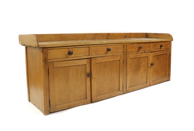 Lot 540A - A large pine low dresser or apple sorting table