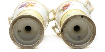 Lot 183 - A pair of porcelain vases and covers by KPM