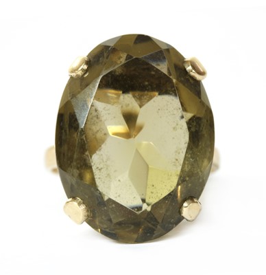 Lot 226 - A 9ct gold single stone smoky quartz ring