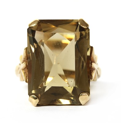 Lot 227 - A 9ct gold single stone smoky quartz ring