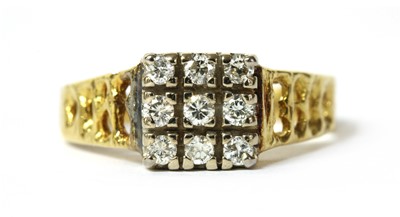 Lot 167 - An 18ct gold diamond set square cluster ring