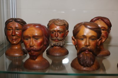 Lot 62 - A COLLECTION OF EIGHT CARVED BOXWOOD MARIONETTE HEADS