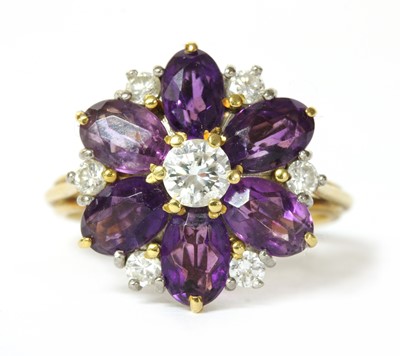 Lot 293 - A gold amethyst and diamond cluster ring