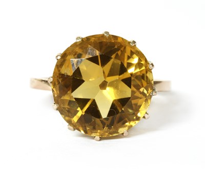 Lot 15 - A gold single stone citrine ring