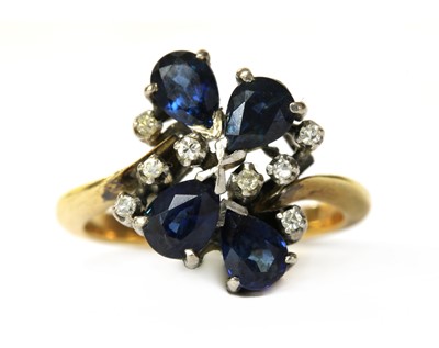 Lot 274 - A gold sapphire and diamond cluster ring