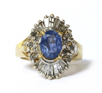 Lot 270 - A gold sapphire and diamond cluster ring