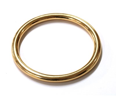 Lot 60 - A gold hollow bangle