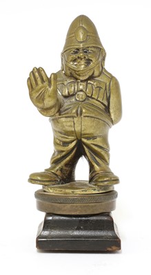Lot 236A - An amusing cast bronze 'policeman' car mascot