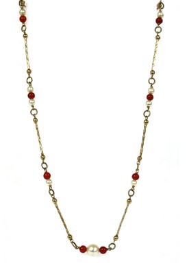 Lot 215 - A gold cultured pearl and coral bead necklace