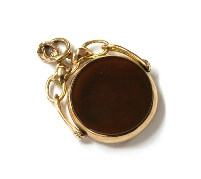 Lot 424 - A 9ct gold cornelian swivel fob