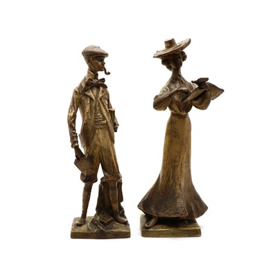 Lot 152 - A pair of Austrian terracotta figures of a gentleman and a lady