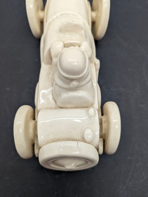 Lot 169 - A Crown Devon crested china racing car