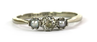 Lot 62 - A white gold three stone diamond and cultured pearl ring