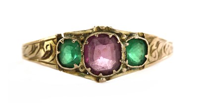Lot 1 - A Victorian 12ct gold garnet and paste three stone ring