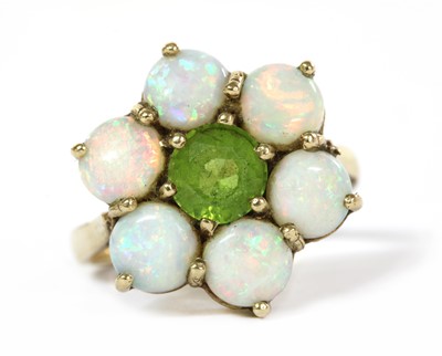 Lot 324 - A 9ct gold peridot and opal cluster ring