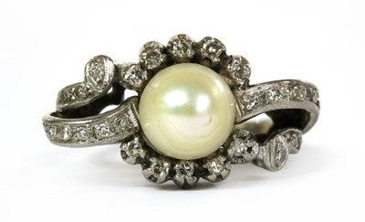 Lot 330 - A white gold cultured pearl and diamond ring