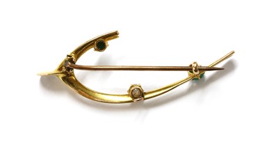 Lot 41 - A Victorian gold diamond and turquoise wishbone brooch