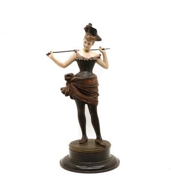 Lot 178 - A spelter figure of a lady holding a cane