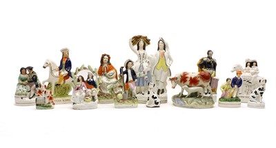 Lot 336 - A collection of Staffordshire figure groups