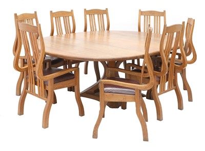 Lot 454 - An oak circular dining table