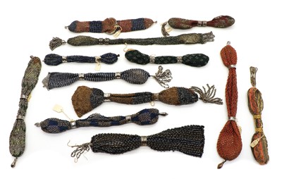 Lot 124 - A collection of twelve beaded miser purses