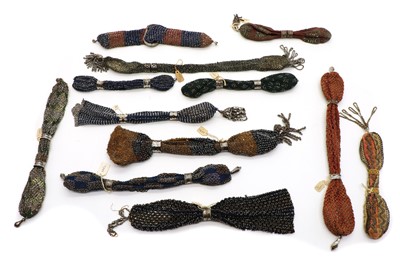 Lot 124 - A collection of twelve beaded miser purses