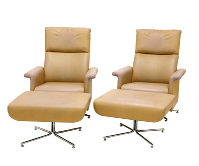 Lot 653 - A pair of Italian tan leather loungers