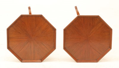 Lot 286 - A pair of walnut tripod tables