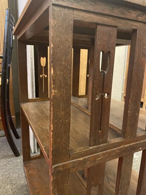 Lot 190 - An oak revolving bookcase