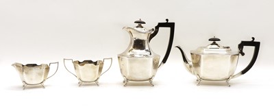 Lot 50 - A silver four piece tea service of angular form