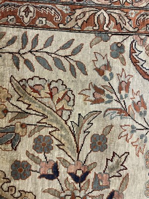 Lot 765 - A Persian silk carpet