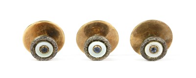 Lot 64 - A set of three cased silver and gold, sapphire and mother-of-pearl dress studs