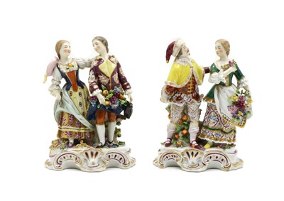 Lot 158 - A pair of porcelain figure groups