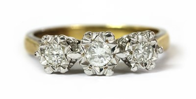 Lot 71 - An 18ct gold three stone diamond ring