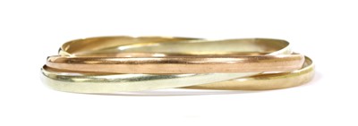 Lot 315 - A 9ct three colour gold bangle