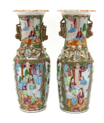 Lot 97 - A pair of Chinese Canton famille rose vases