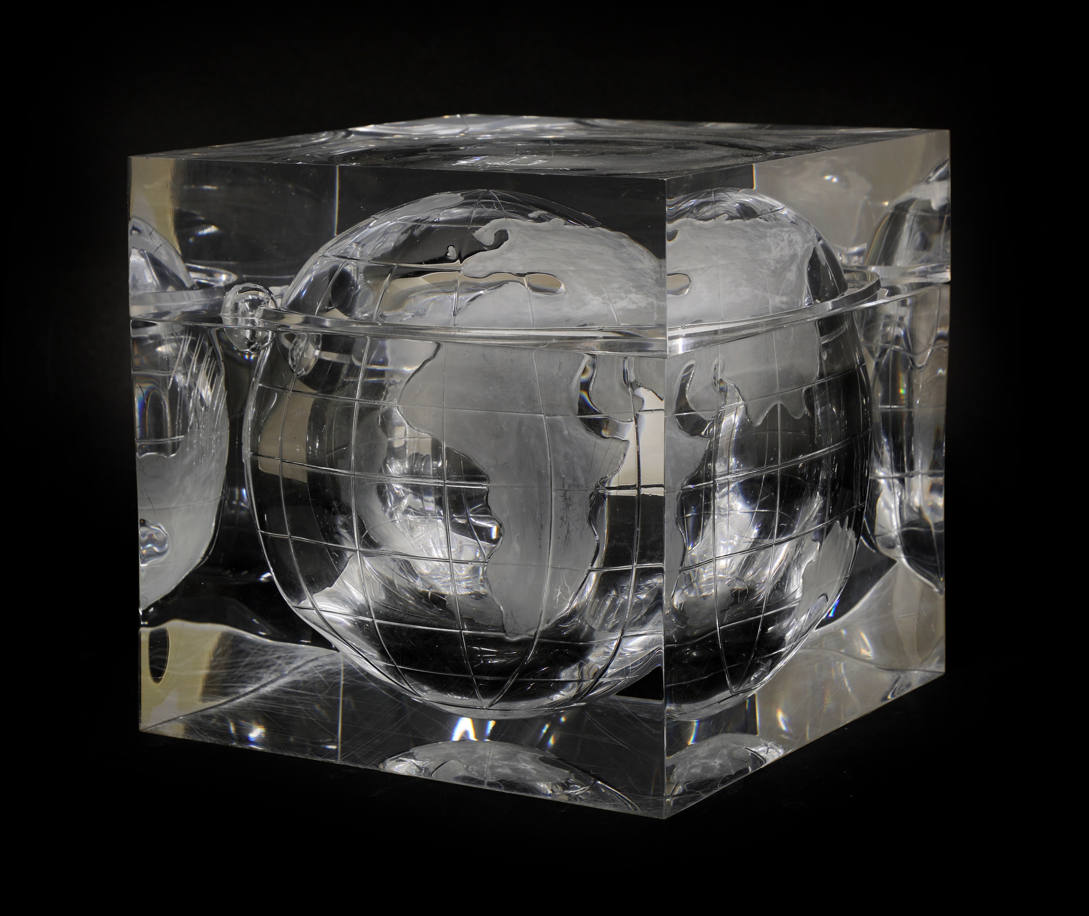 Lot 534 A Lucite 'globe' ice bucket,