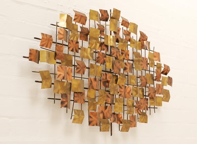Lot 655 - A brass and copper wall sculpture