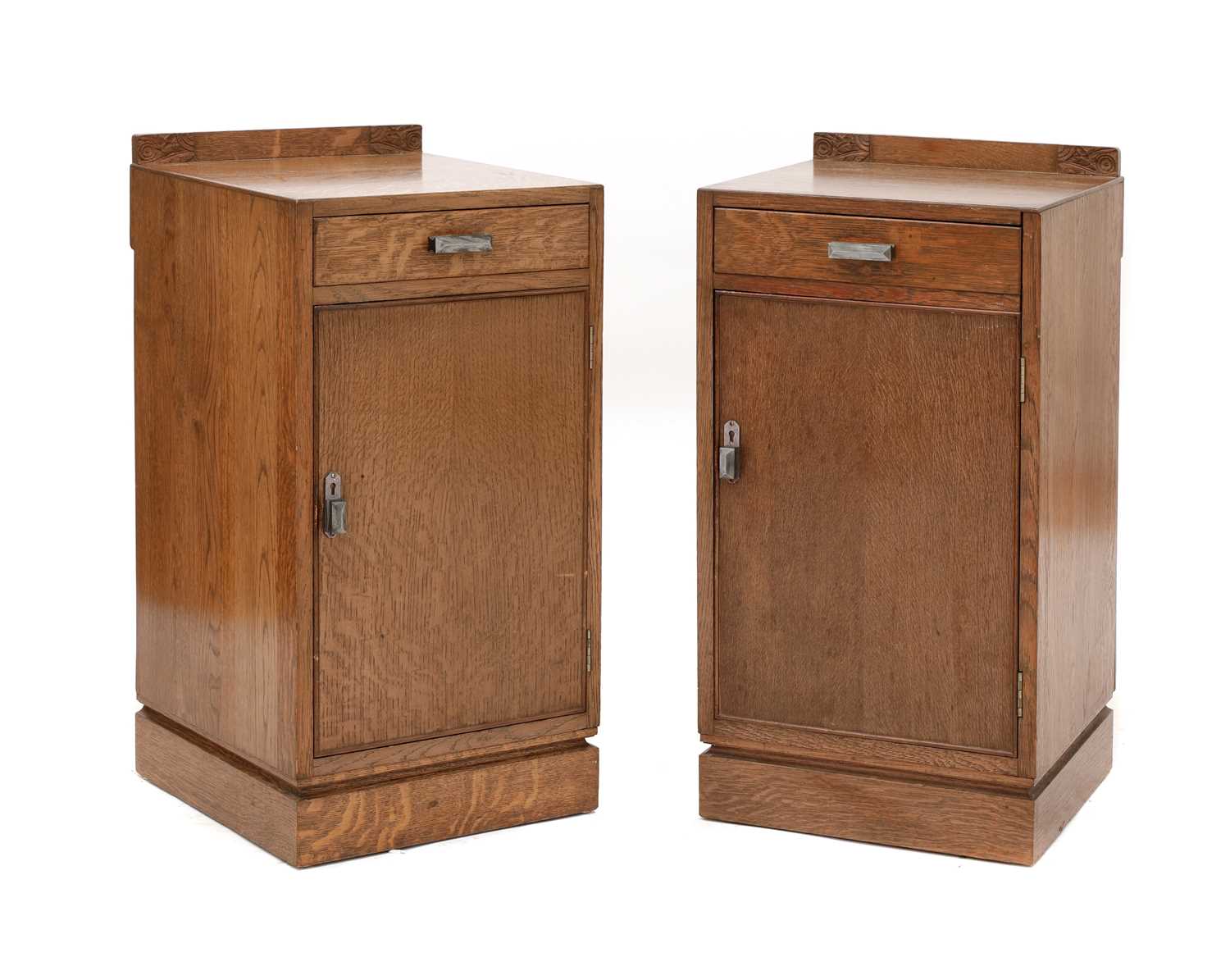 Lot 300 - A pair of Art Deco oak bedside cupboards