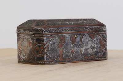 Lot 554 - A copper, silver and brass inlaid casket