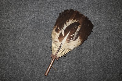 Lot 231 - An African feather fan