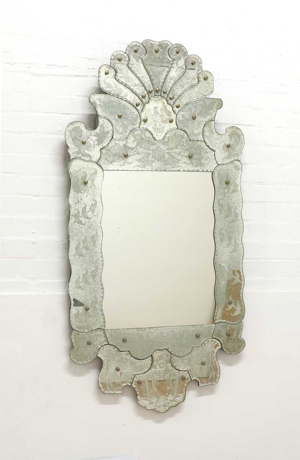 Lot 620 - A Venetian-style mirror