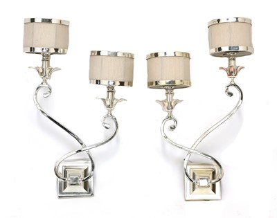 Lot 613 - A pair of chrome twin-branch wall lights