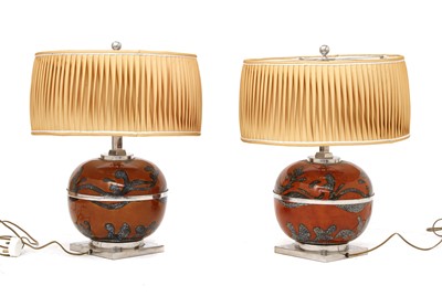 Lot 553 - A pair of ceramic table lamps