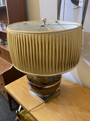 Lot 553 - A pair of ceramic table lamps