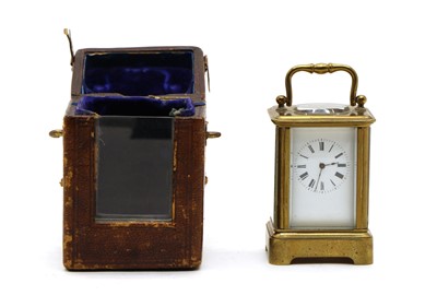 Lot 207 - An early 20th century miniature brass cased carriage clock