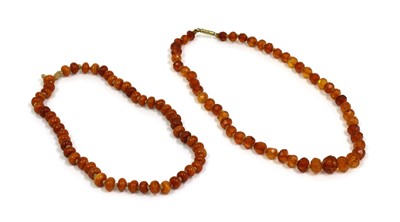 Lot 125 - A single row uniform butterscotch amber bead string