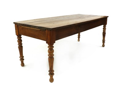 Lot 561 - A provincial French cherry and oak farmhouse kitchen table